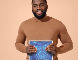 A man holds a scan of his digestive system.